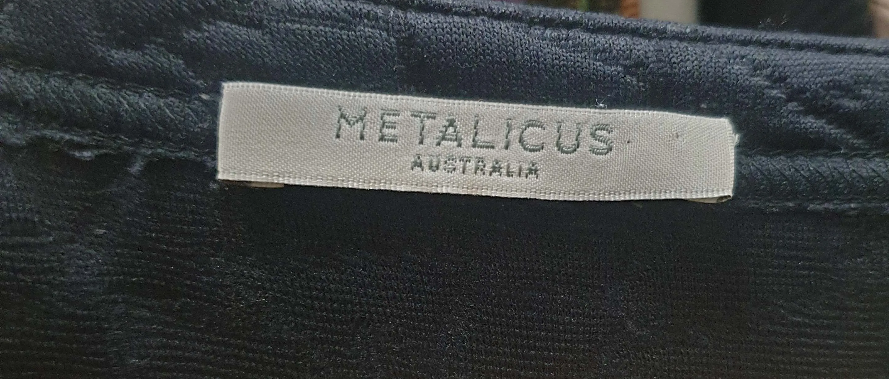 Metalicus black quilted dress fits size 10