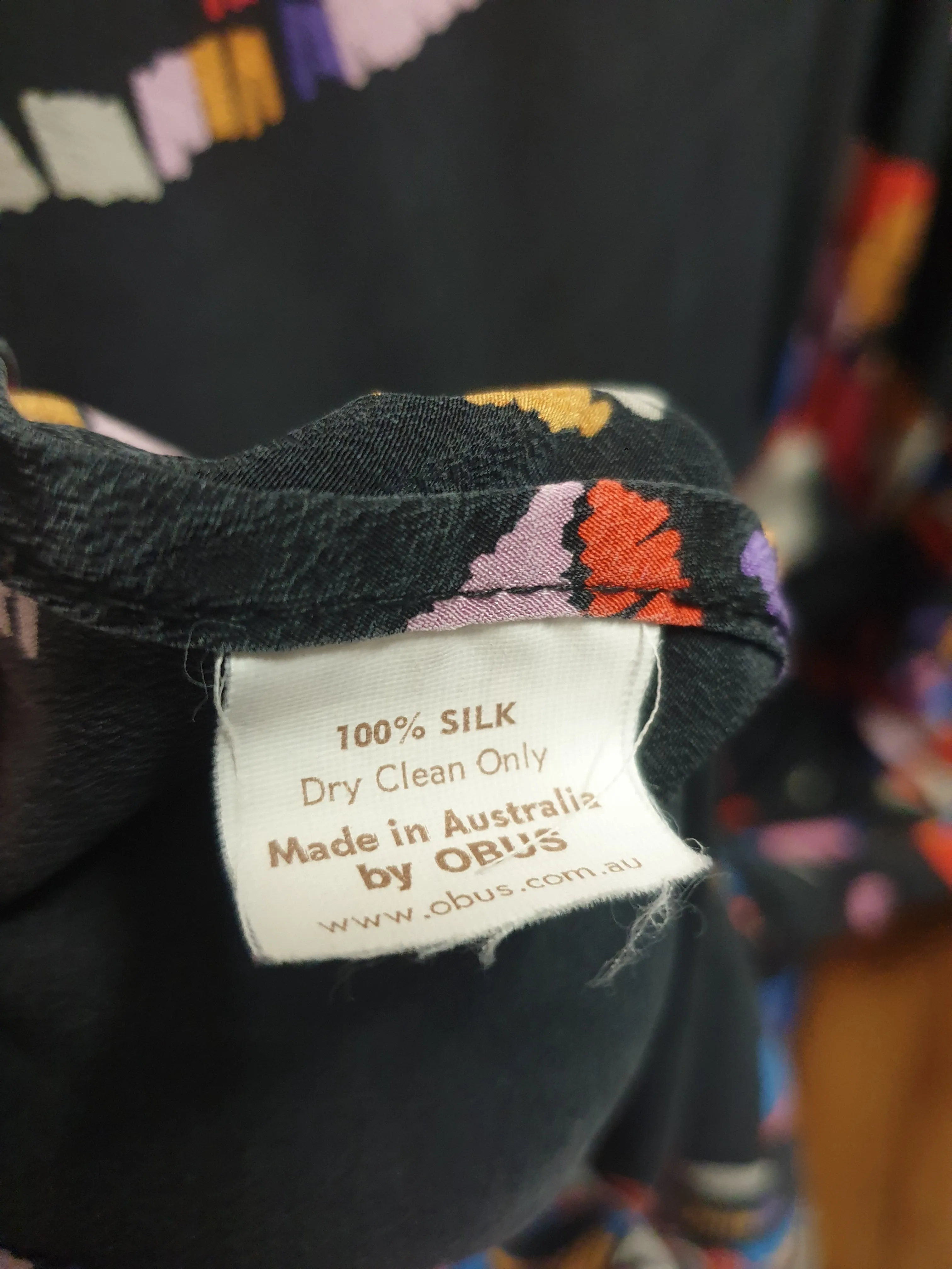 Obus vintage black-based 100% silk dress size 1, best fits size 8 (note: two visible crease lines)